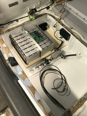 Inside car with control board on top.
