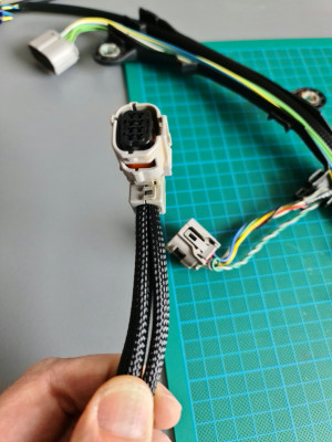 Adding individual braided protection to the resolver wires and the mg1 temp sensor wires