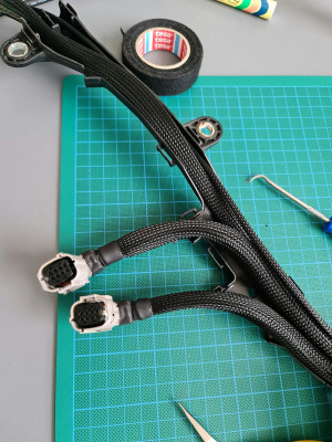 Braided sheath is left longer at other end so that once it's spliced into the inverter &quot;pigtails&quot; it can then extend over top of said splice.