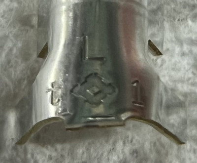Sumitomo terminal 8240-4932 (brass), showing the embossing and Sumitomo logo