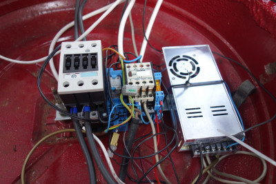 Left to right: Main DC switch, precharge, AC disconnect, AC present relay, 12V system charger (aka Meanwell PSU)