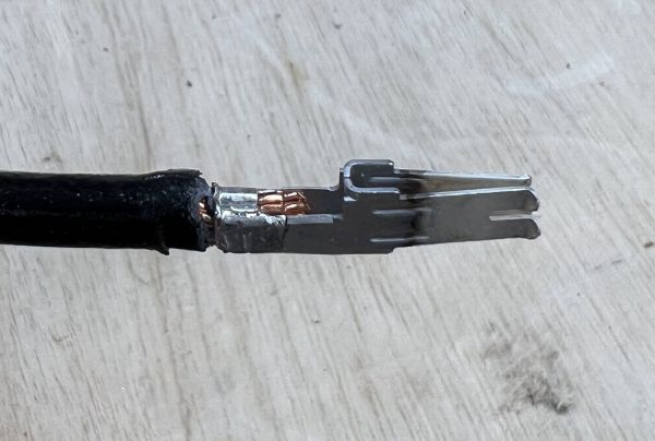 Molex 8 AWG open barrel terminal, modified by removing the rear insulation crimp section, then crimped using Pressmaster MCT and die 4300-3146, using the 10 AWG position.