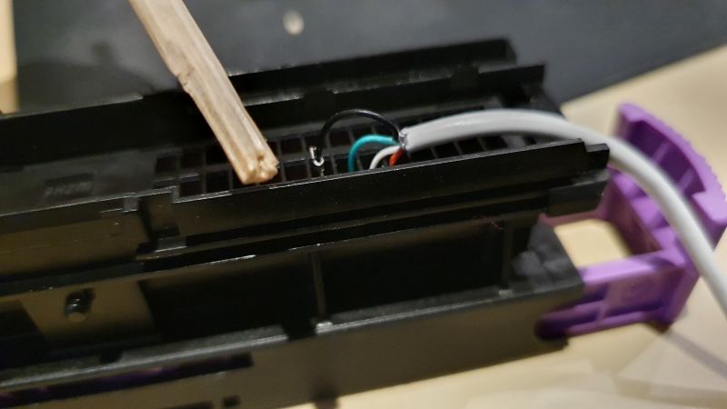 File:Square and kerb a chopstick for pushing the crimped pins.jpg