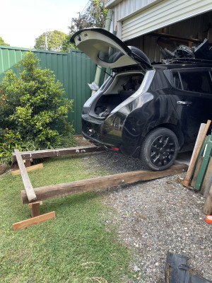 These temporary ramps let me push the car out by myself to make room for the engine crane.  They are built this long to also suit the Rodeo
